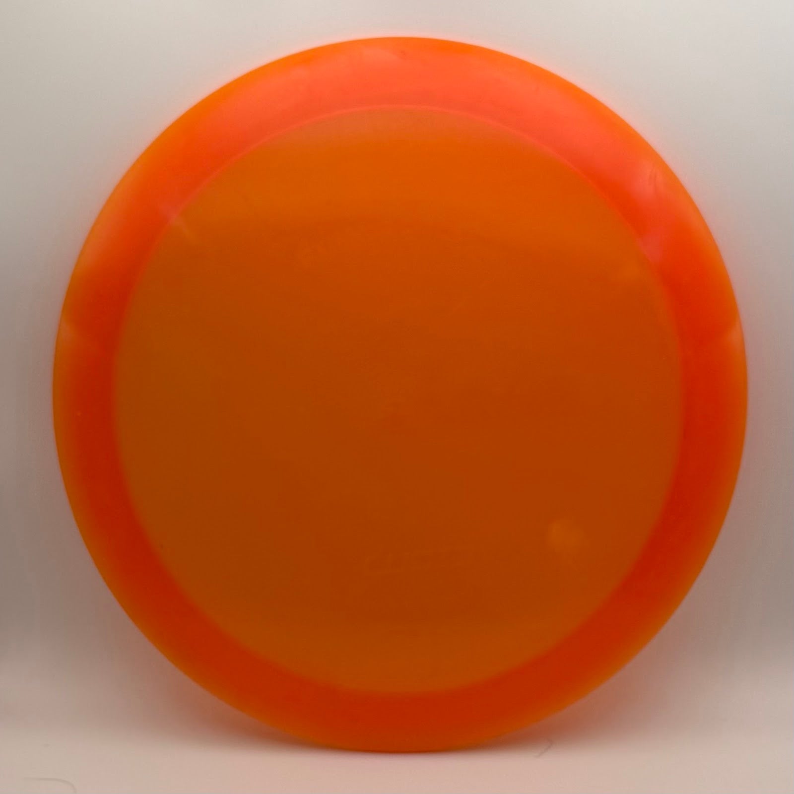 Dynamic Discs Lucid Escape bright orange translucent front
