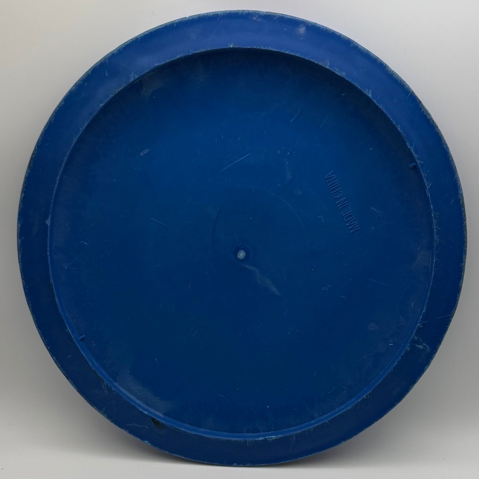 Generic Frisbee vibrant blue back showing MADE IN CHINA